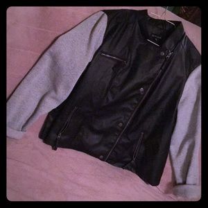 Faux leather jacket w/ sweatshirt arms.